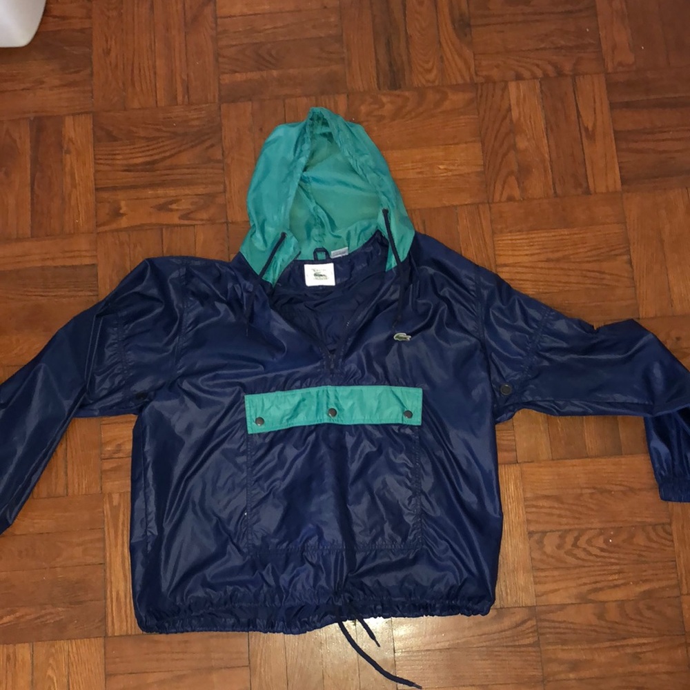Vintage 90s Lacoste windbreaker size large it’s teal & navy blue 9/10 condition